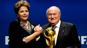 FIFA President Joseph Sepp Blatter, right, poses with Dilma Rousseff, President of Brazil, left